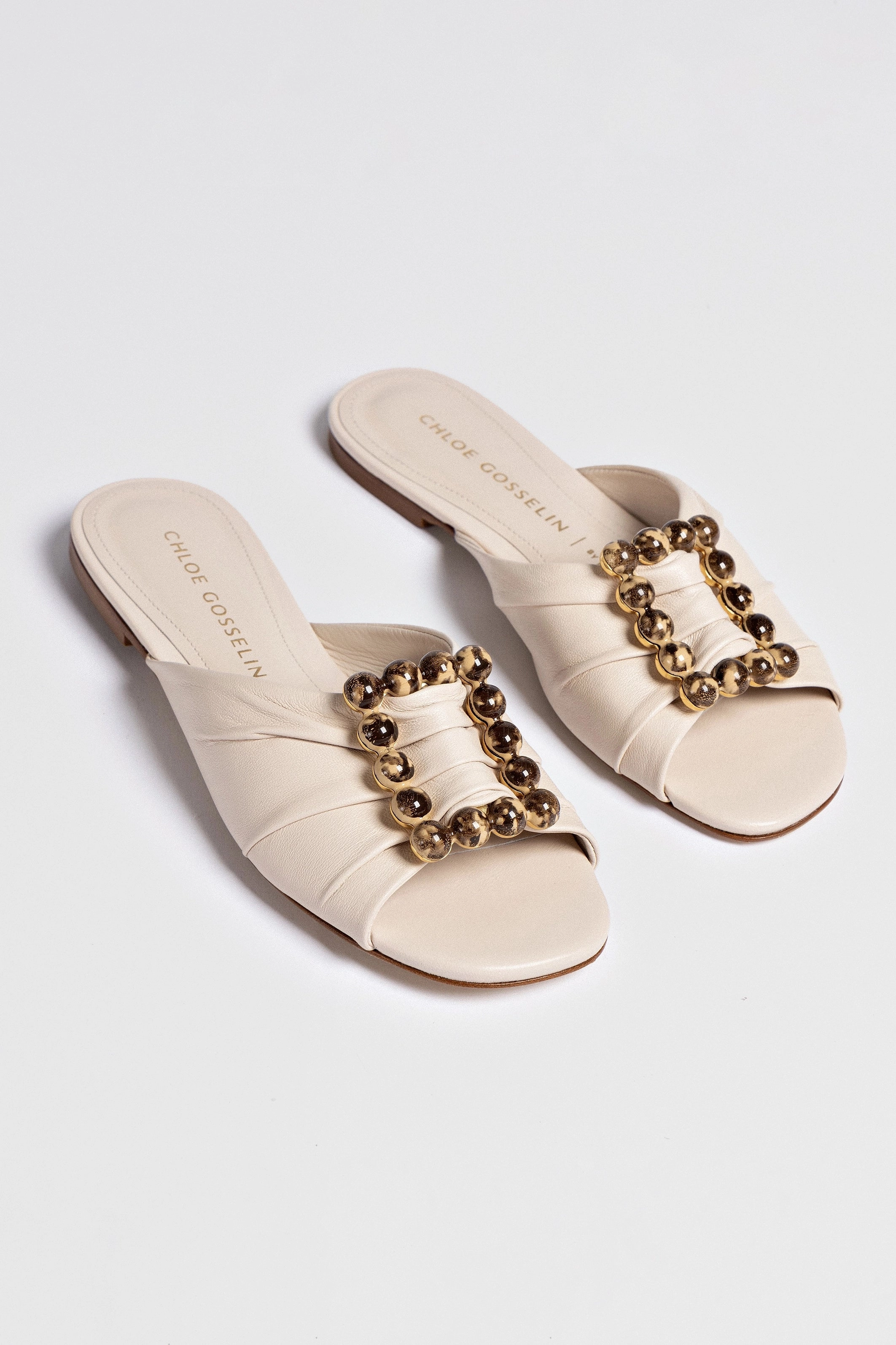 Chloe Gosselin by Larroudé Nova Flat In Puff Cream Leather